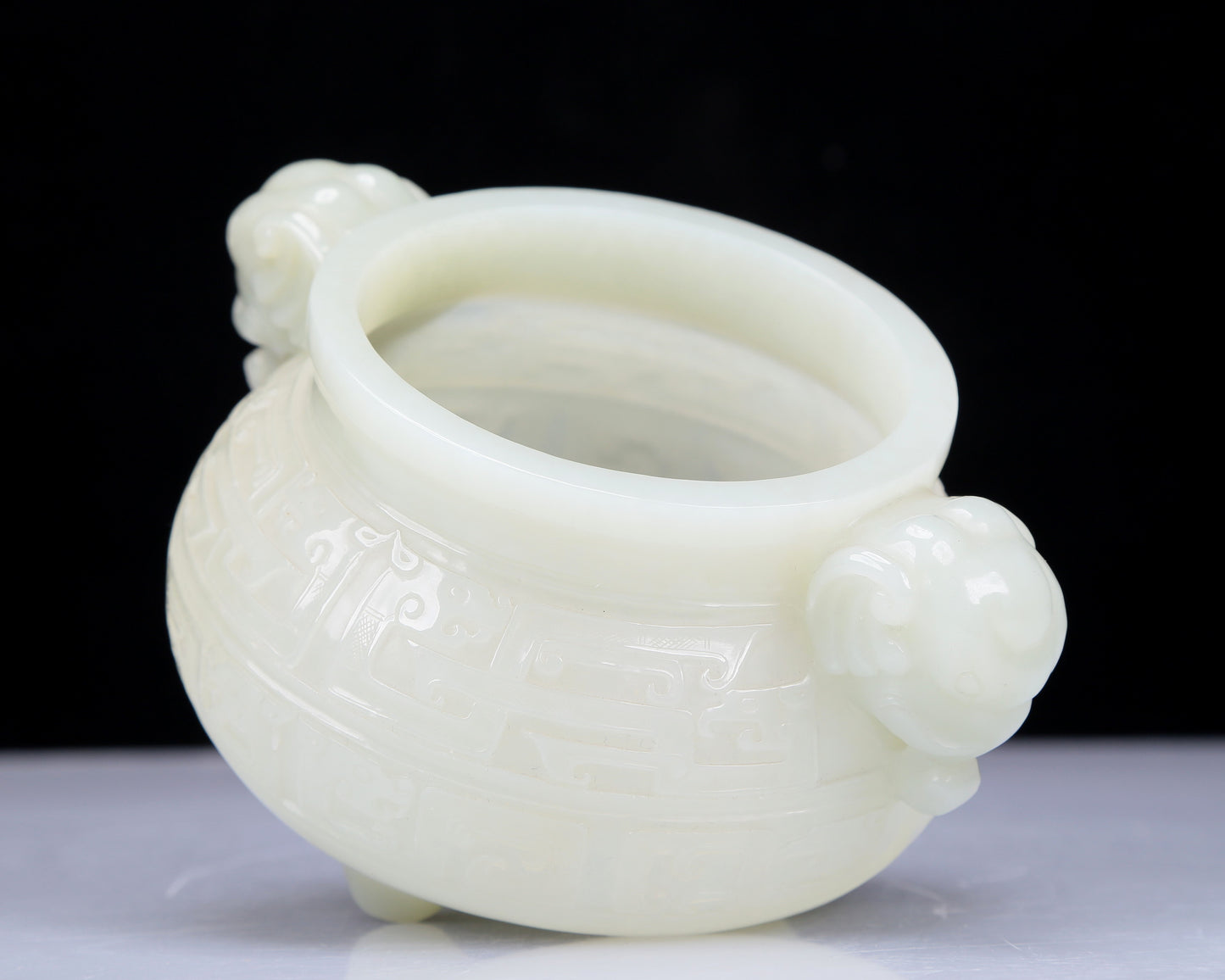 A Precious White Jade 'Animal Mask' Elephant-Handled Tripod Censer