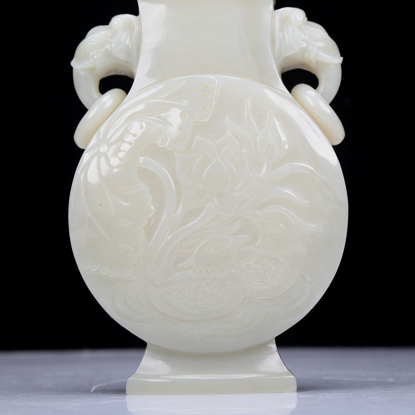 A Precious White Jade 'Bird& Flower' Elephant-Handled Vase And Cover