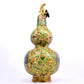 A cloisonné 'Landscape Figure' bottle in the shape of a gourd