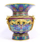 A cloisonné vase with 'Twinkle lotus and animal face' pattern