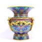 A cloisonné vase with 'Twinkle lotus and animal face' pattern