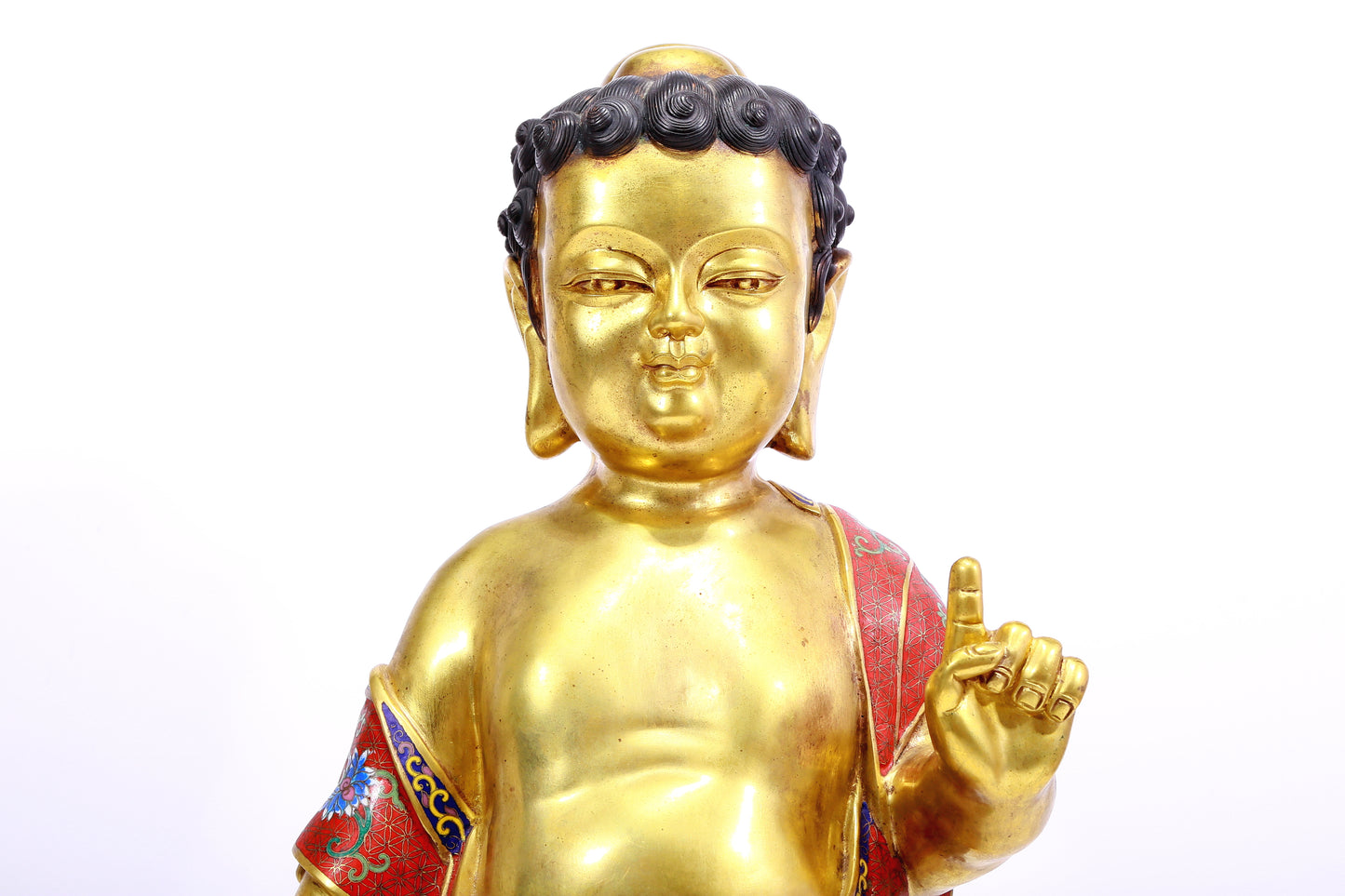 A cloisonné statue of Gautama Buddha