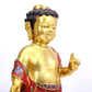 A cloisonné statue of Gautama Buddha