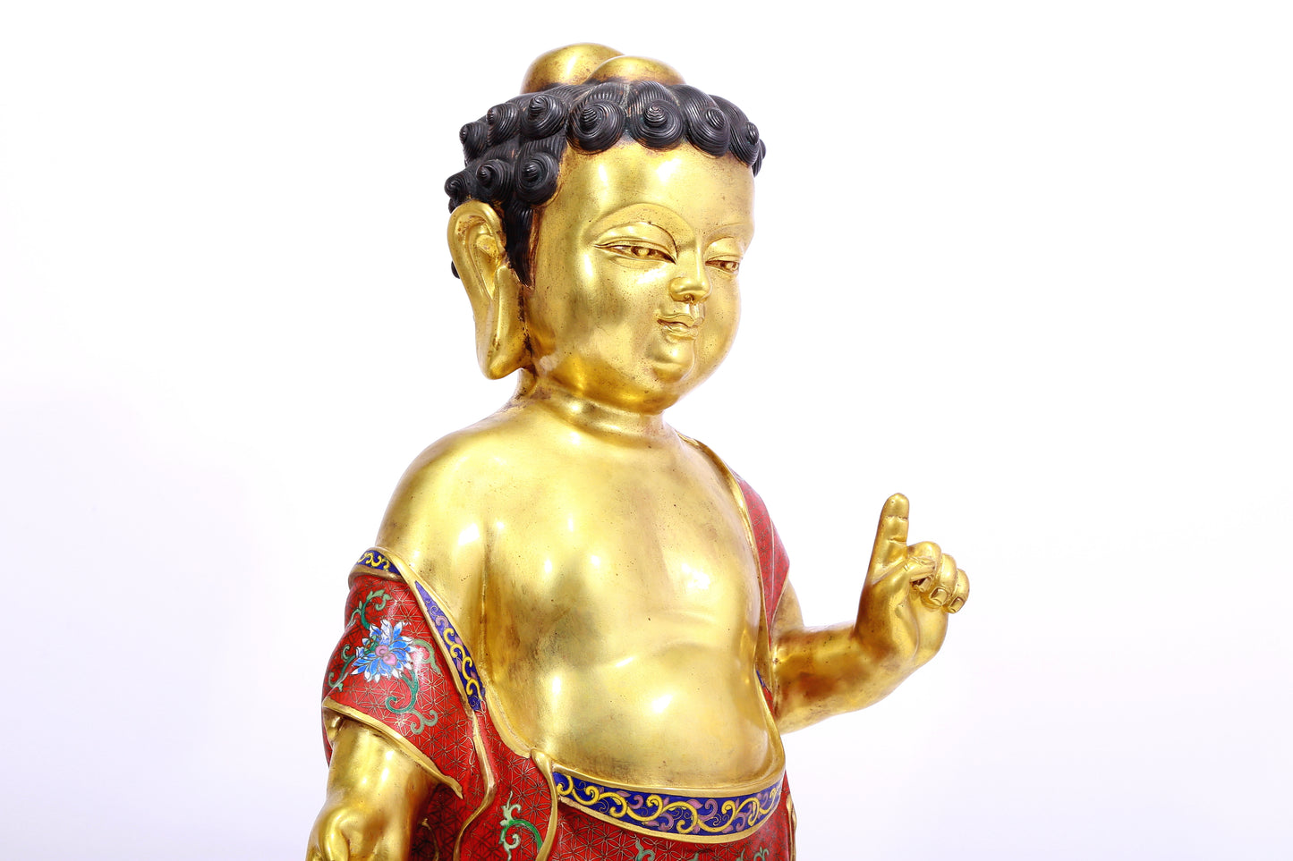 A cloisonné statue of Gautama Buddha