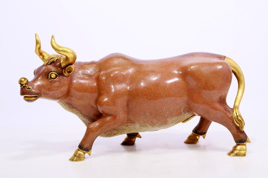 A cloisonné cow ornament