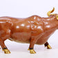 A cloisonné cow ornament