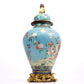 A cloisonne flower and bird pattern jar