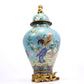 A cloisonne flower and bird pattern jar