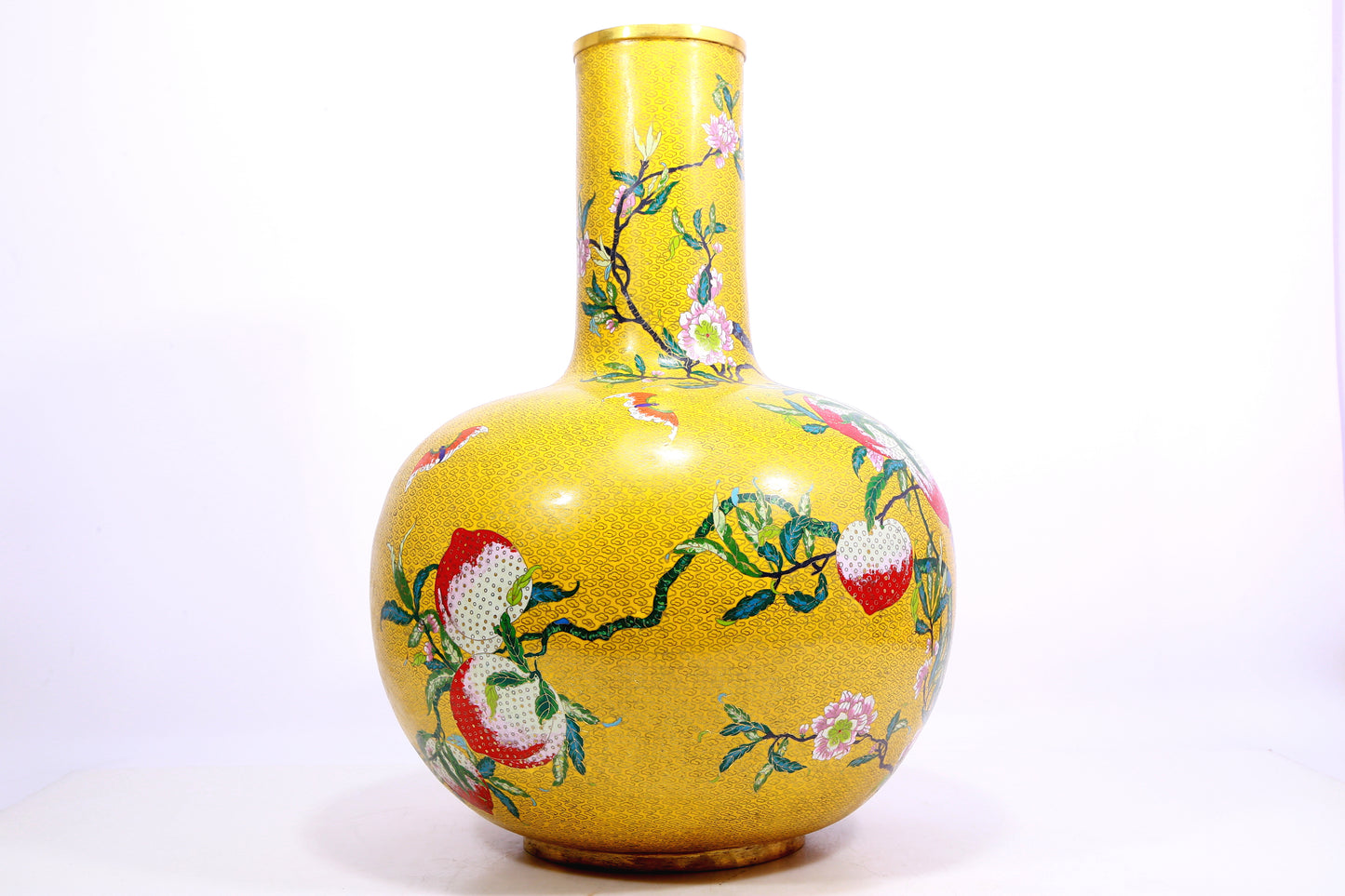 A cloisonné peach pattern bottle