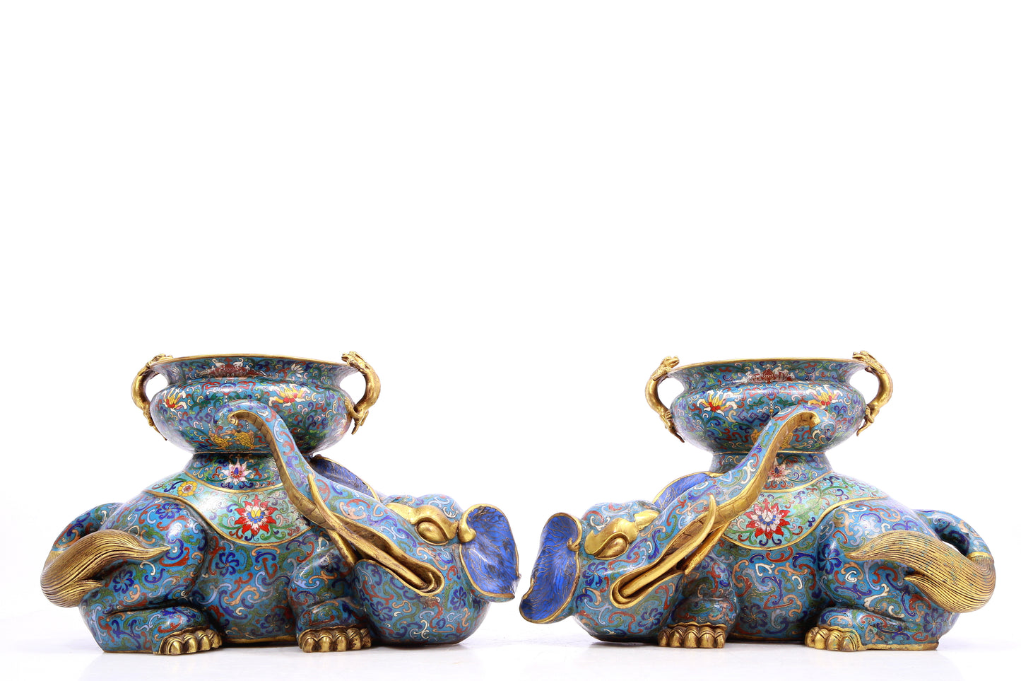 A pair of cloisonné elephant ornaments