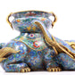 A pair of cloisonné elephant ornaments