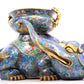 A pair of cloisonné elephant ornaments