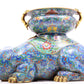 A pair of cloisonné elephant ornaments