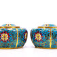 A pair of cloisonné jars with lotus pattern