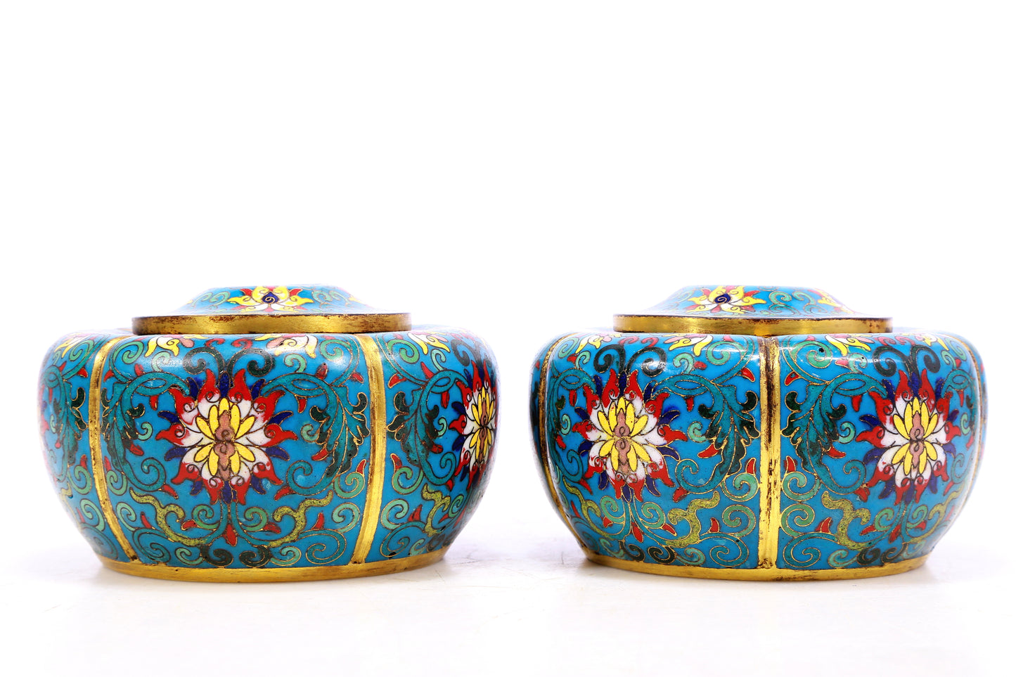 A pair of cloisonné jars with lotus pattern