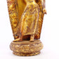 A solemn gilt bronze statue of Tara