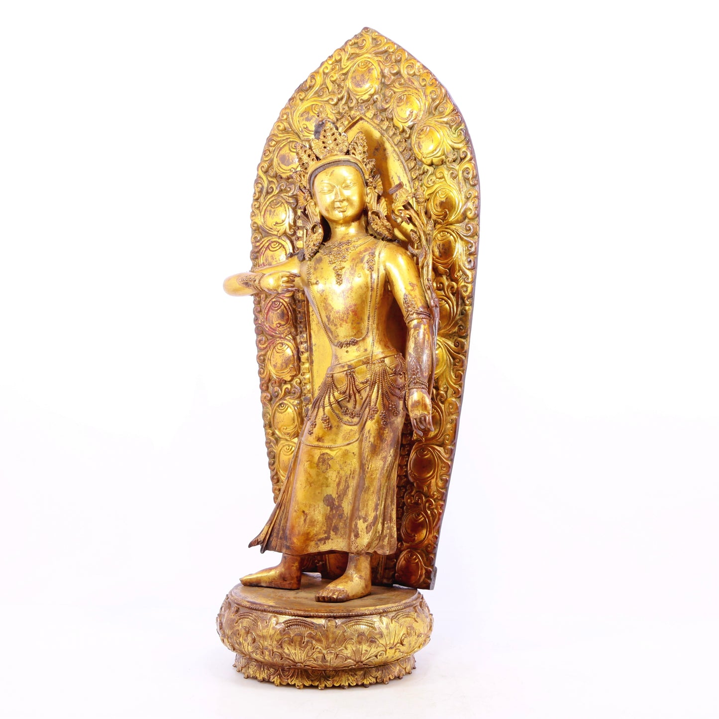 A solemn gilt bronze statue of Tara