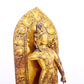 A solemn gilt bronze statue of Tara