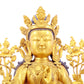 A solemn gilt bronze statue of green Tara