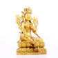 A solemn gilt bronze statue of green Tara