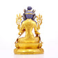 A solemn gilt bronze statue of green Tara