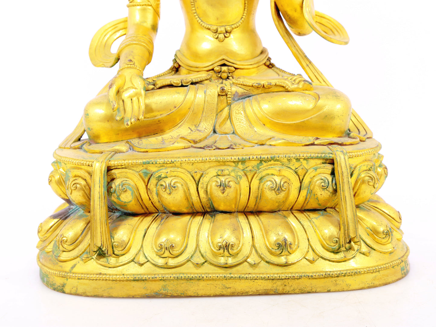 A solemn gilt bronze statue of Bodhisattva