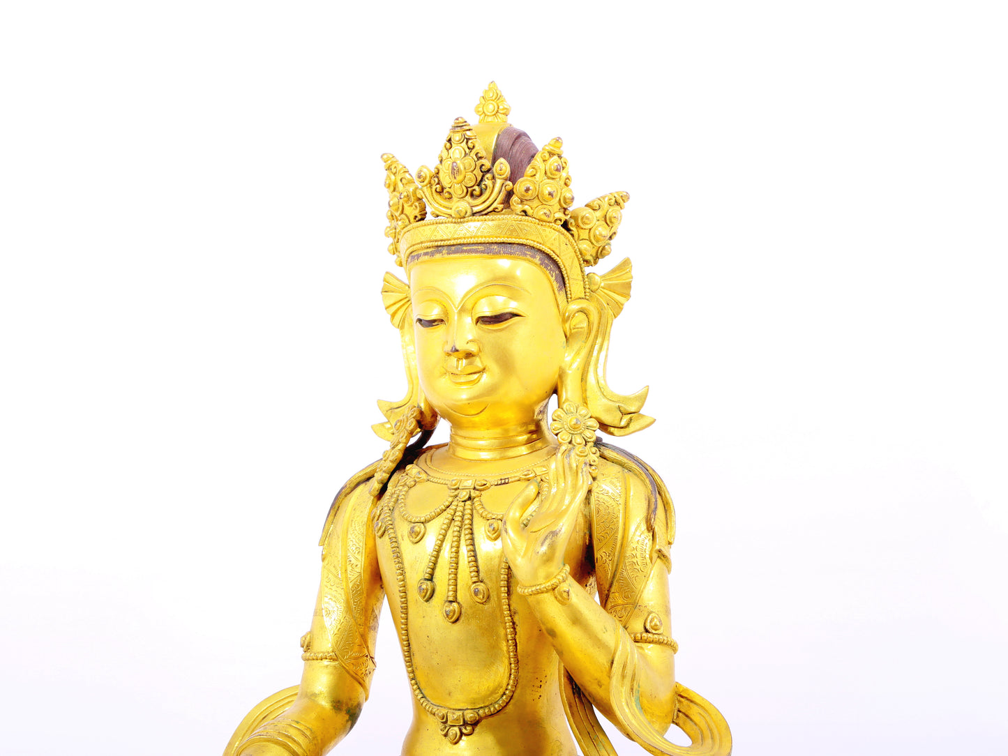 A solemn gilt bronze statue of Bodhisattva