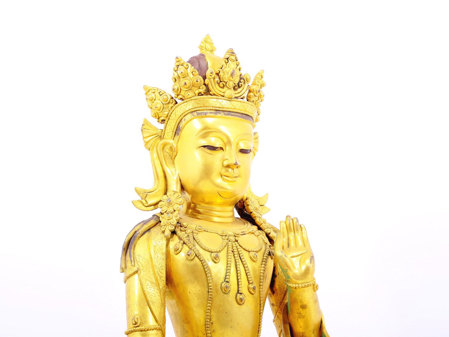 A solemn gilt bronze statue of Bodhisattva