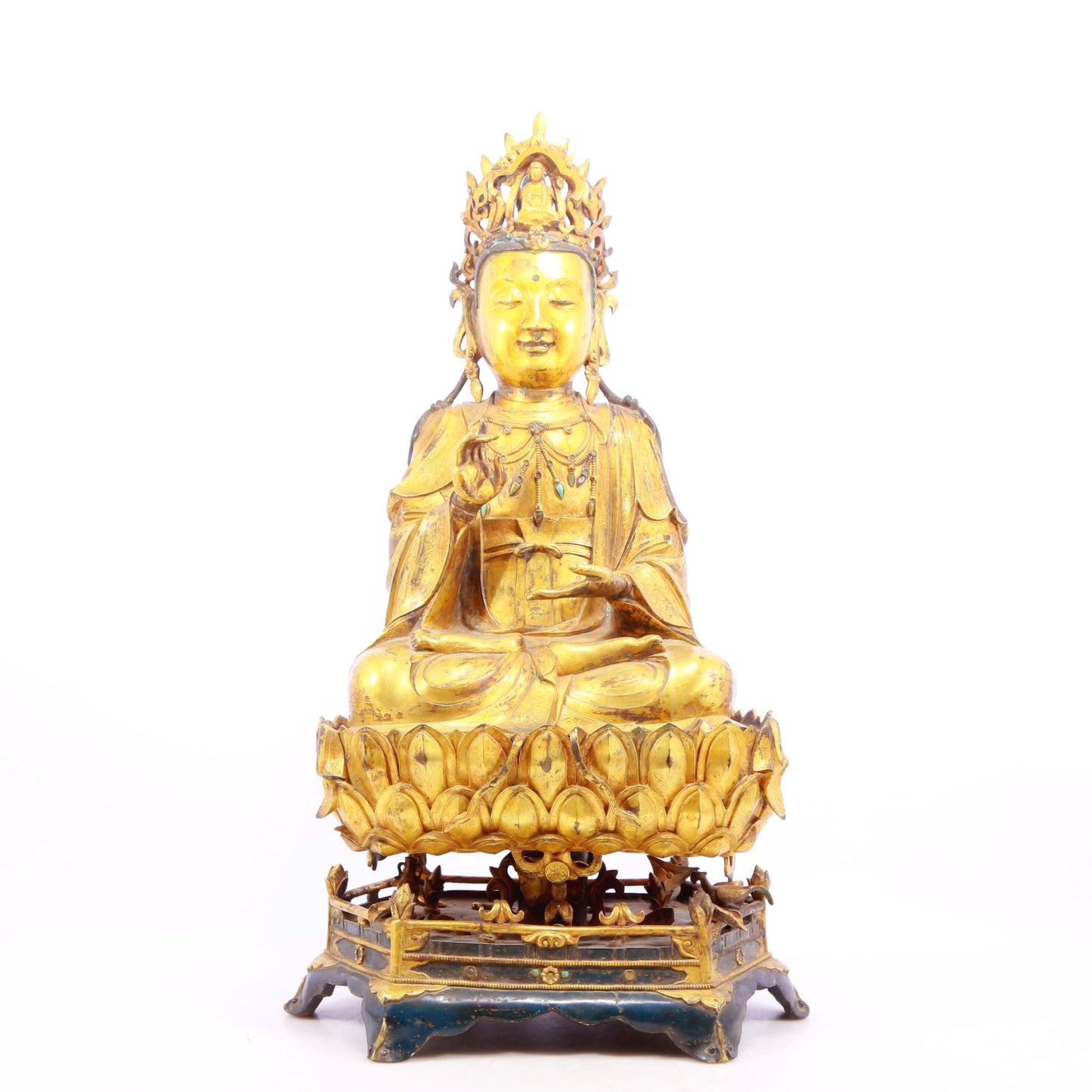 A solemn gilt bronze statue of Guanyin