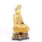 A solemn gilt bronze statue of Guanyin