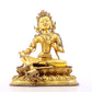 A serene gilt bronze statue of green Tara