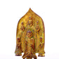 A serene gilt bronze statue of Gautama Buddha