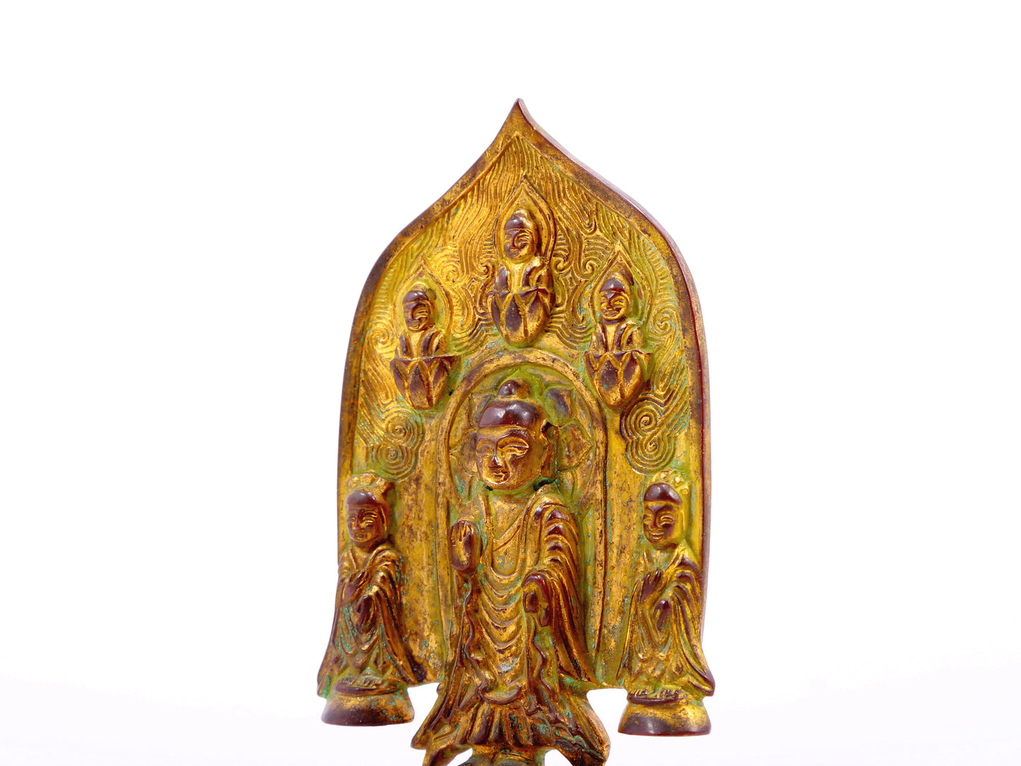 A serene gilt bronze statue of Gautama Buddha