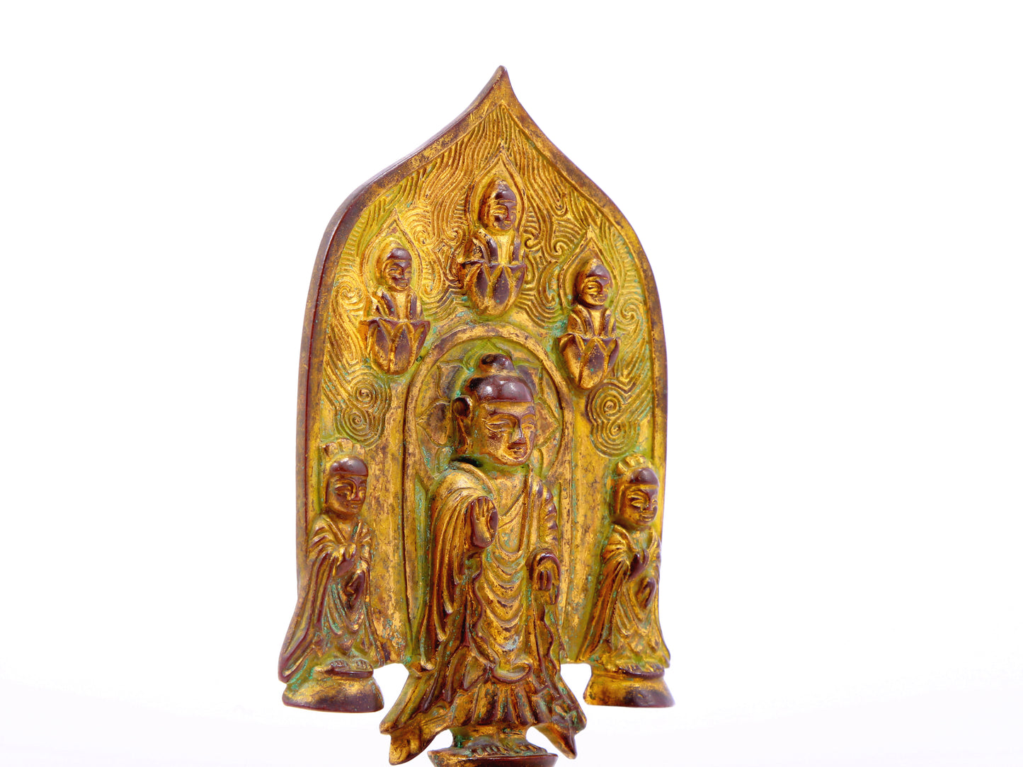 A serene gilt bronze statue of Gautama Buddha