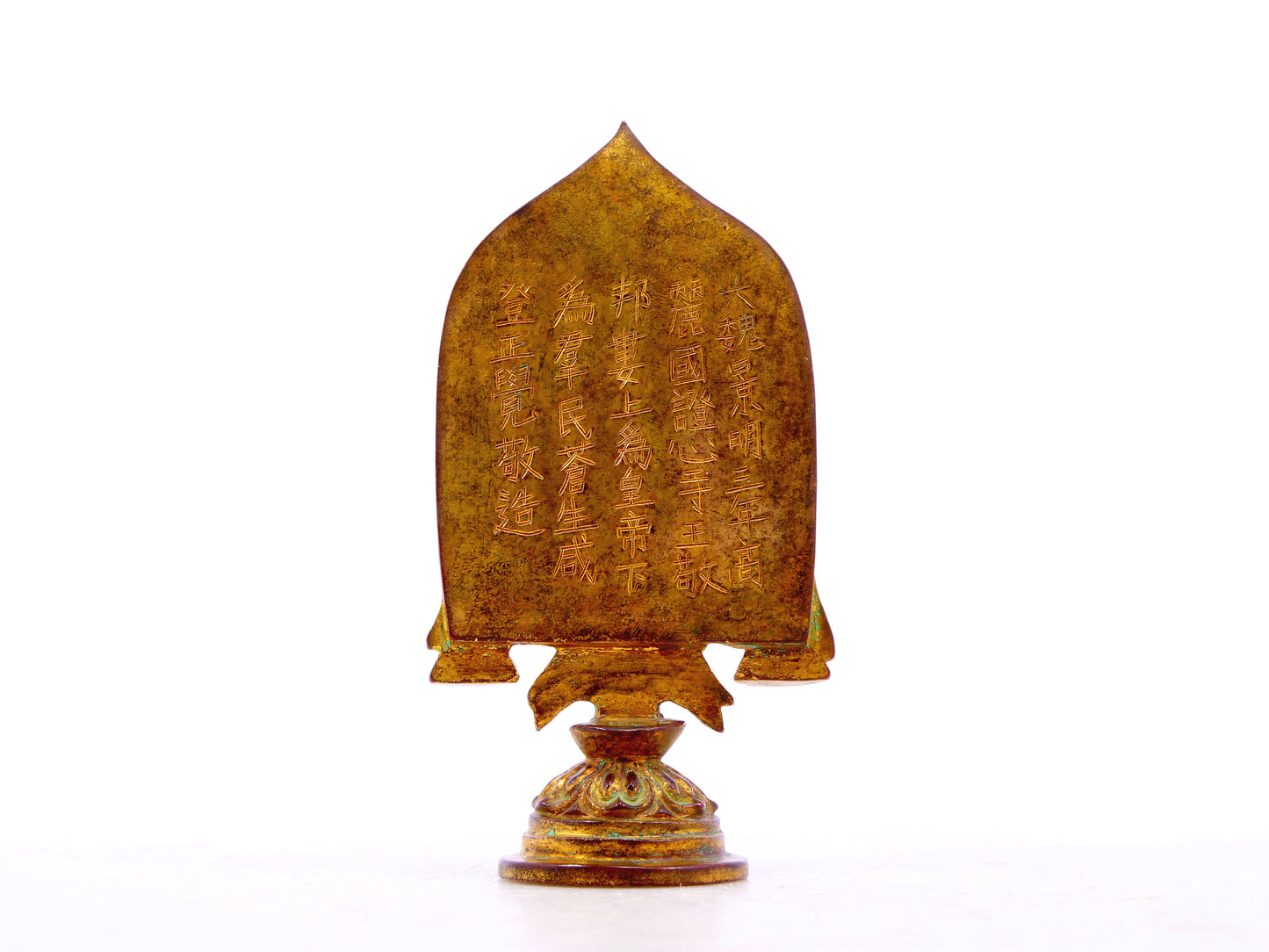 A serene gilt bronze statue of Gautama Buddha