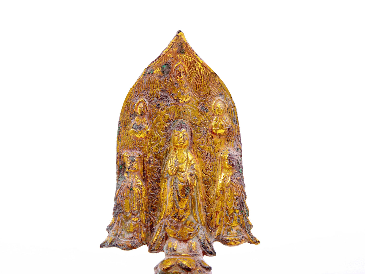 A serene gilt bronze statue of Gautama Buddha