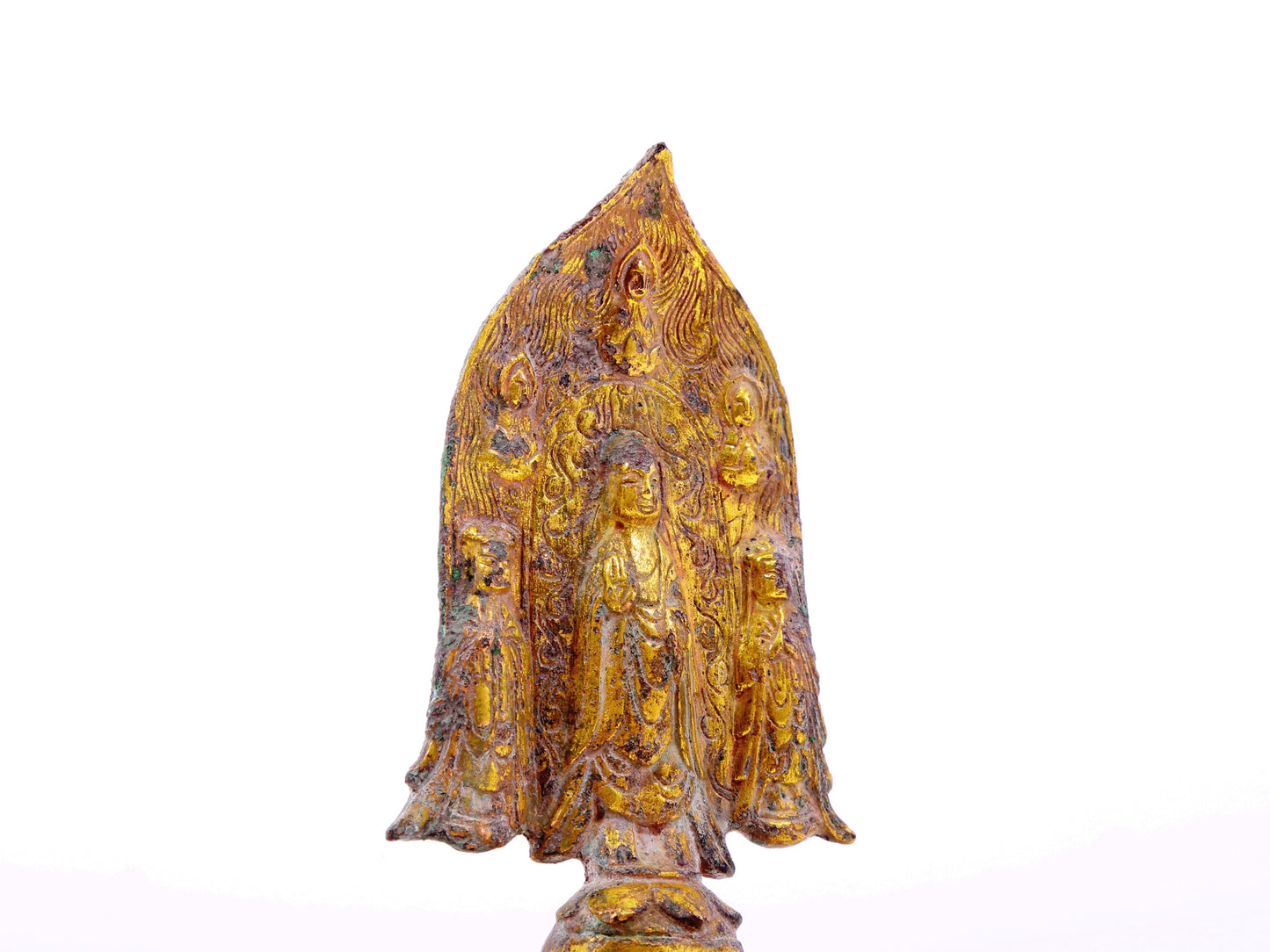 A serene gilt bronze statue of Gautama Buddha