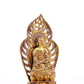 A serene gilt bronze statue of Gautama Buddha