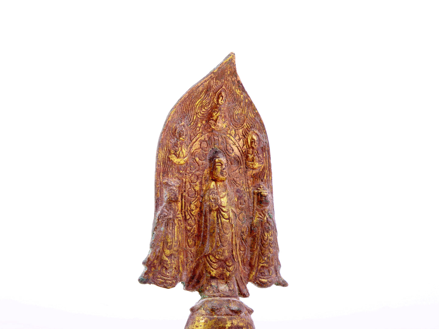 A serene gilt bronze statue of Gautama Buddha