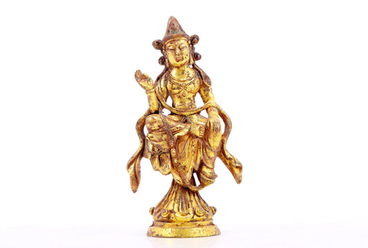 A serene gilt bronze statue of Bodhisattva