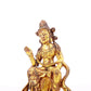 A serene gilt bronze statue of Bodhisattva