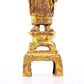 A serene gilt bronze statue of Gautama Buddha