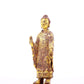 A serene gilt bronze statue of Gautama Buddha