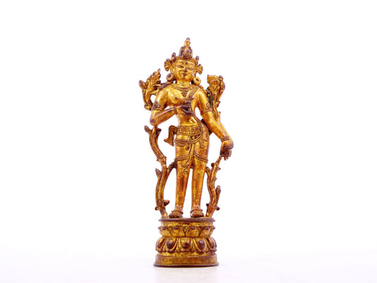 A serene gilt bronze statue of Tara