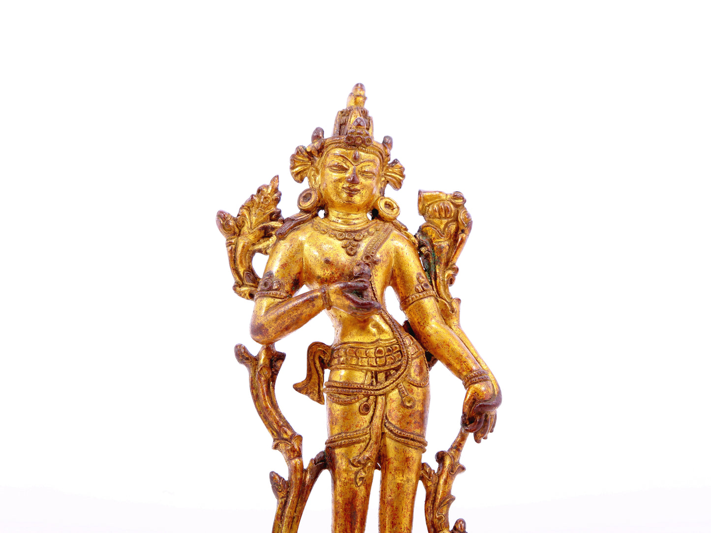 A serene gilt bronze statue of Tara