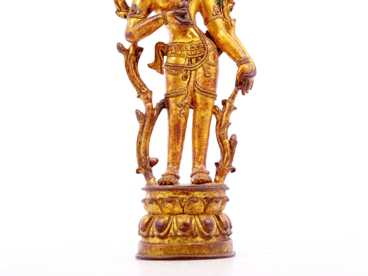 A serene gilt bronze statue of Tara