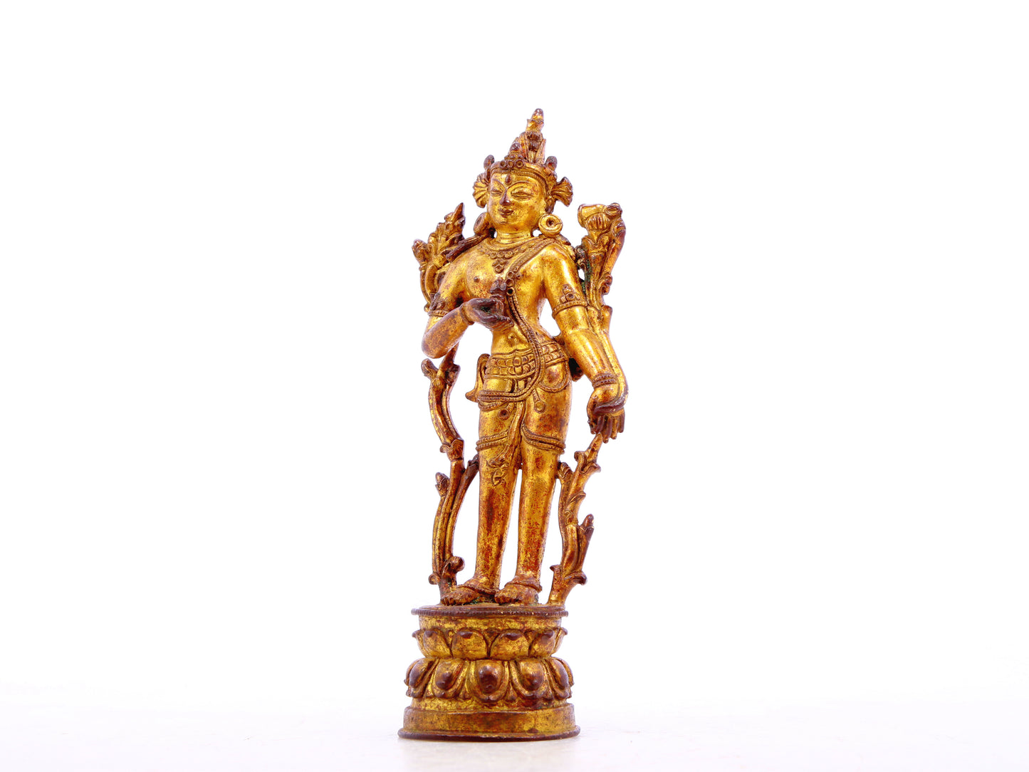 A serene gilt bronze statue of Tara