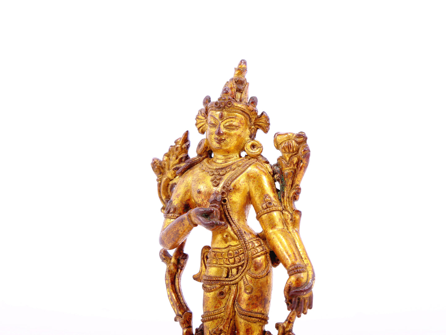 A serene gilt bronze statue of Tara