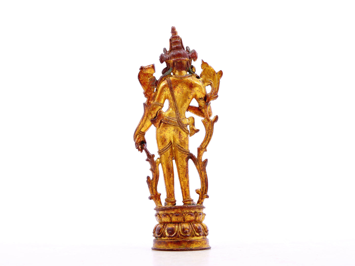 A serene gilt bronze statue of Tara