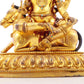 A serene gilt bronze statue of the Heavenly King inlaid with precious stones